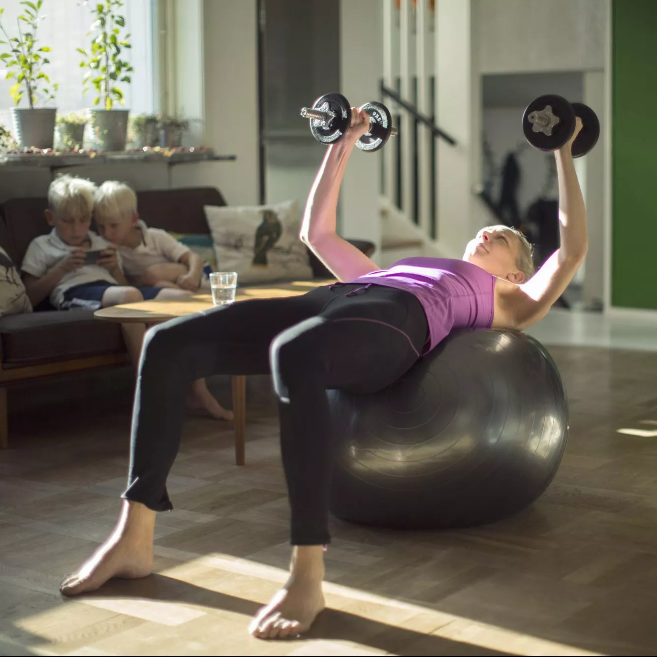 woman using workout motivation tips to get in a workout at home