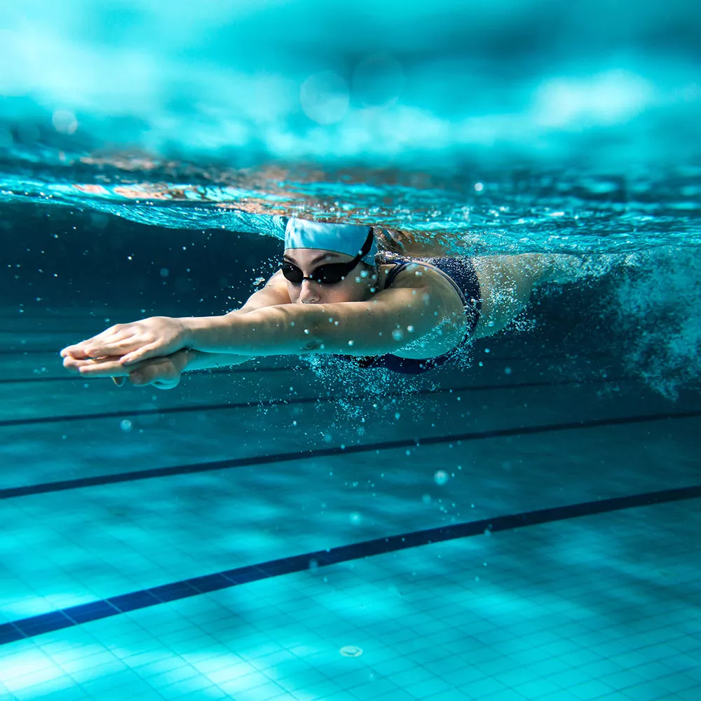 woman swimming for weight loss motivation non scale goals